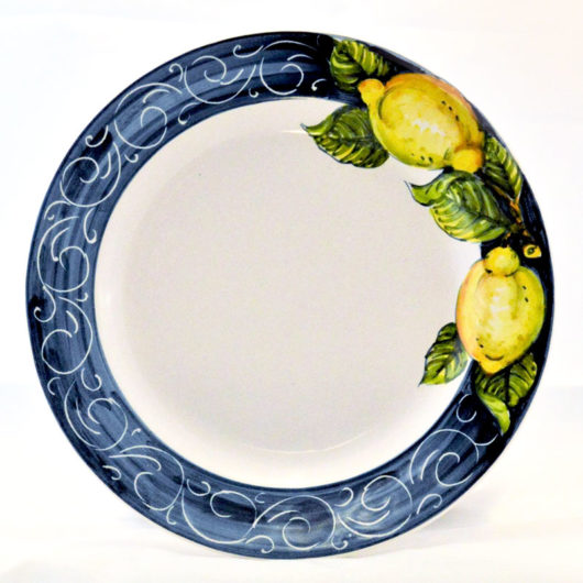 Piatto frutta servito limoni blu
